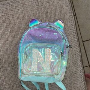 Used Justice girl’s initial backpack